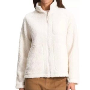 North Face women’s size small white Sherpa zipper jacket with pockets like new.